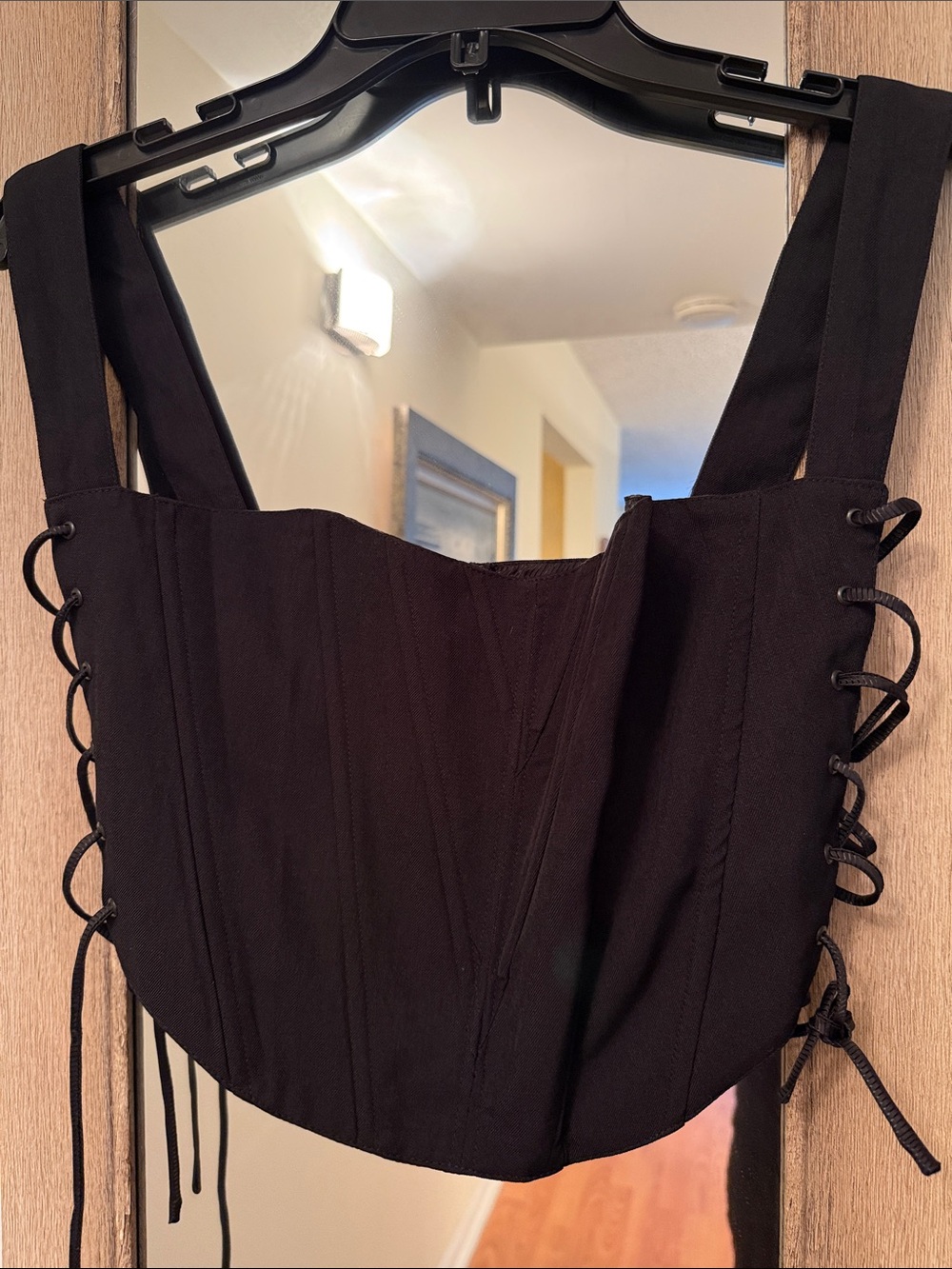 KHAITE Black Lace-Up Corset Top with Front Zipper
